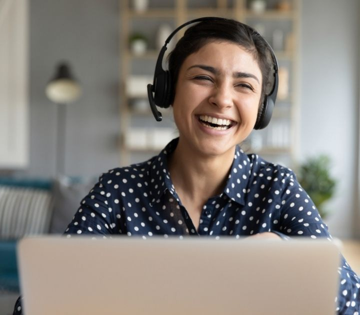 customer service representative smiling and laughing