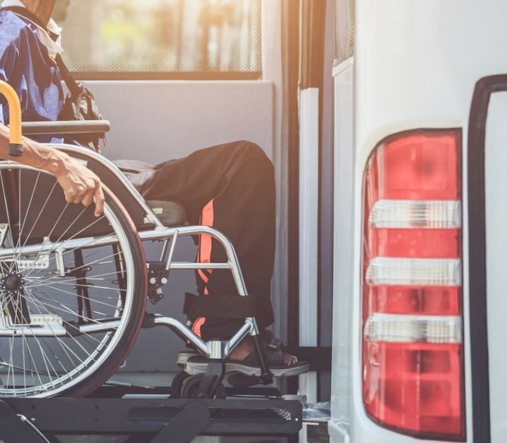 wheel chair loading onto a charter bus