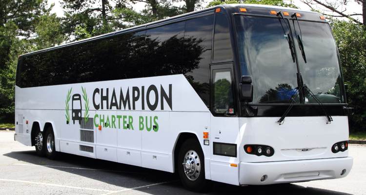 a white beverly hills bus rental from champion charter bus